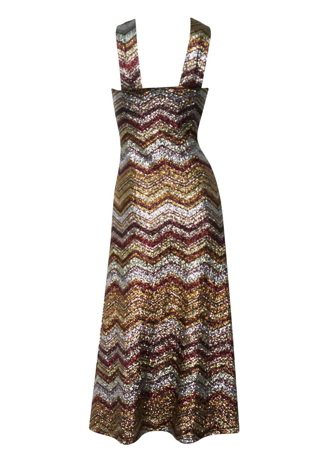 Multicolored zigzag patterned dress on a white background