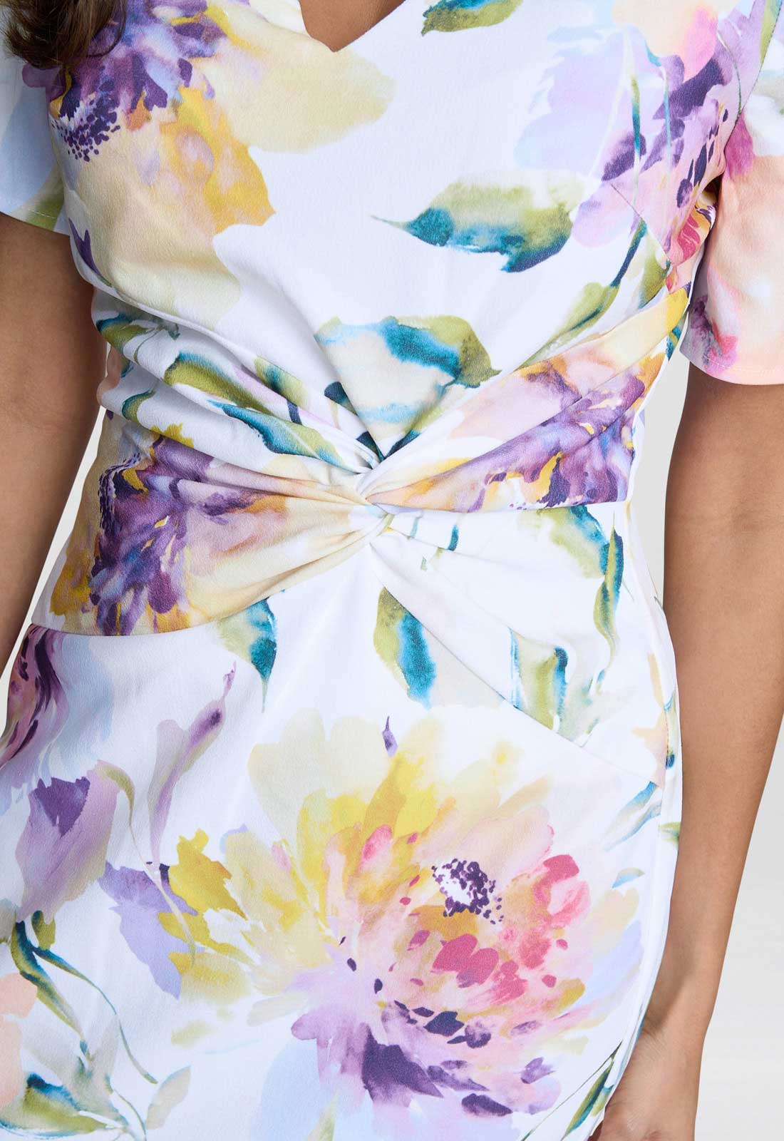 Colorful floral dress with a white background