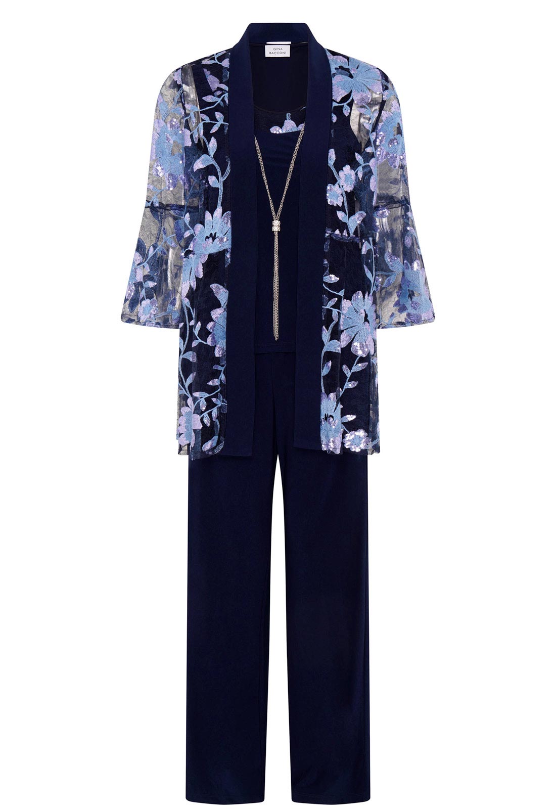 Navy outfit with floral jacket on a white background
