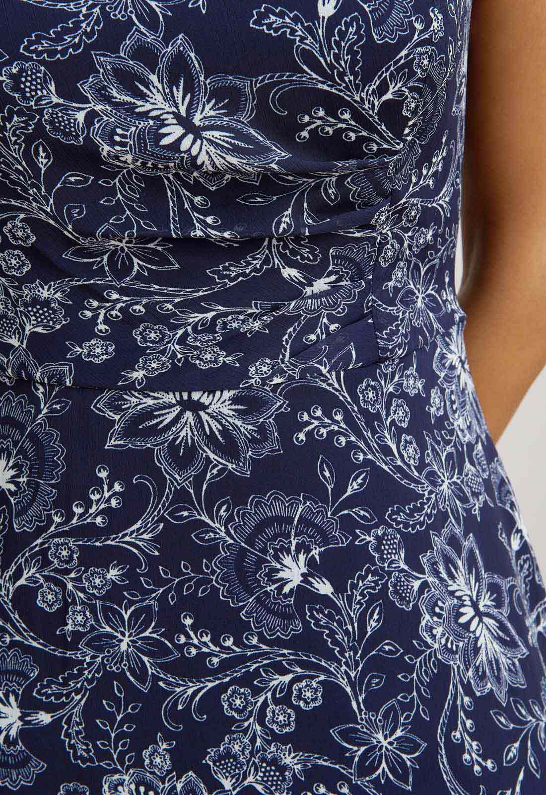 Navy blue dress with white floral pattern