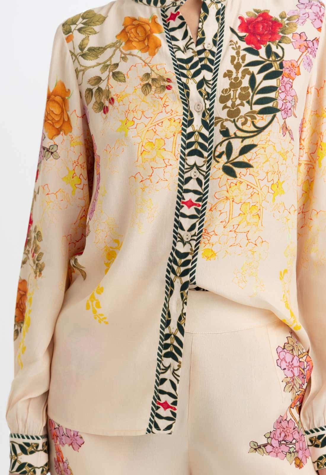 Floral and zebra print jacket on a plain background