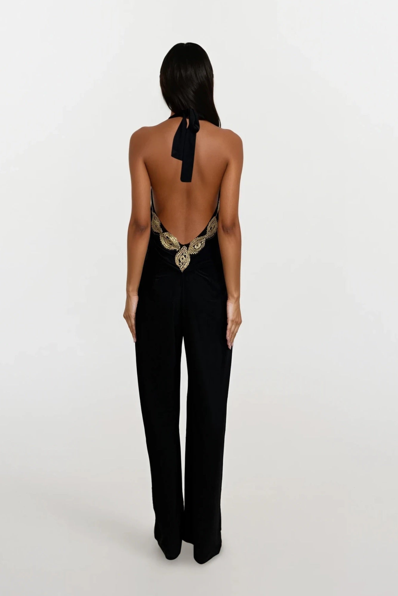 Sasha Black Backless Wide Leg Jumpsuit With Gold Leaf Trim - Detail View | Honor Gold