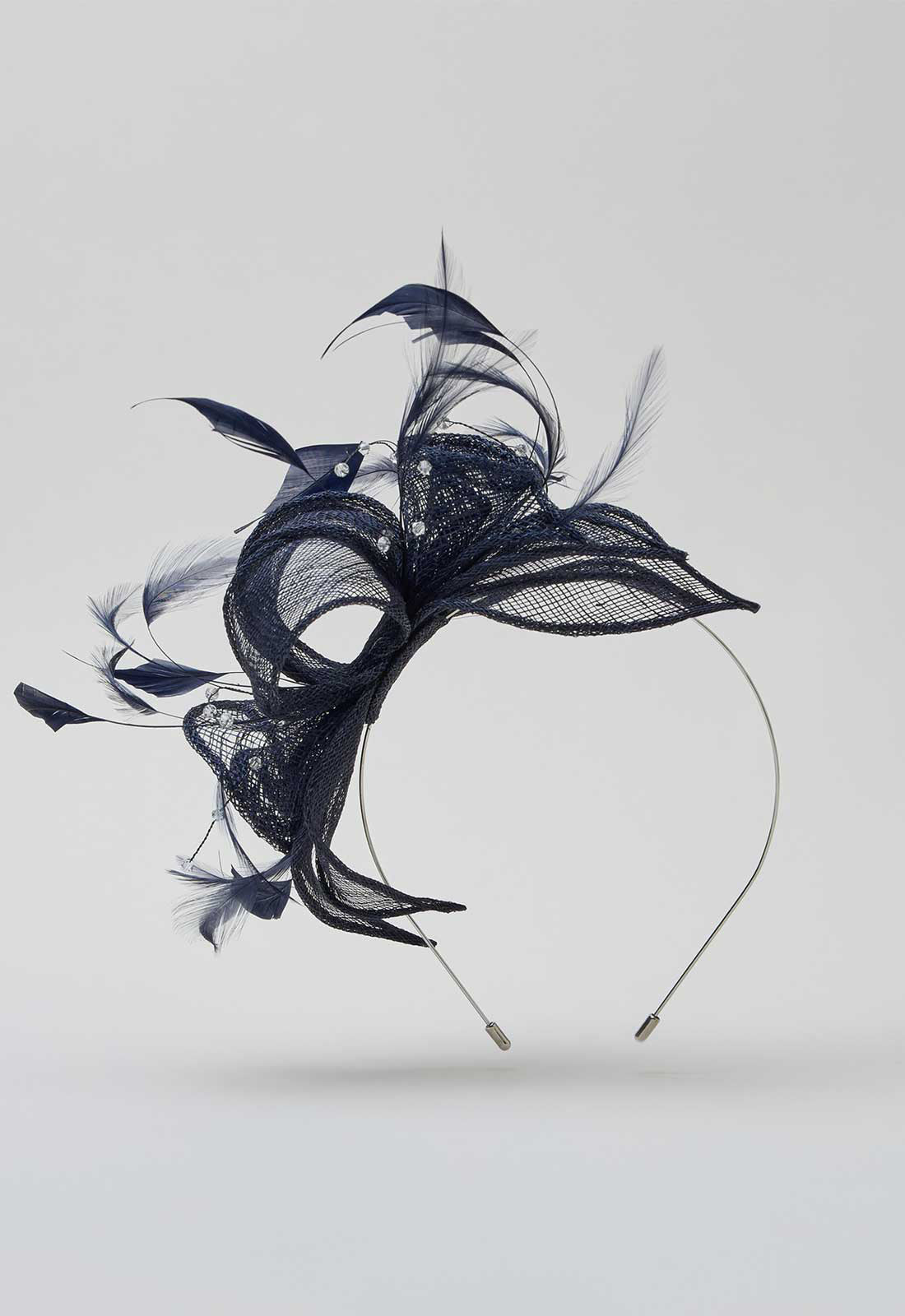 feather and pearl effect fascinator in blue