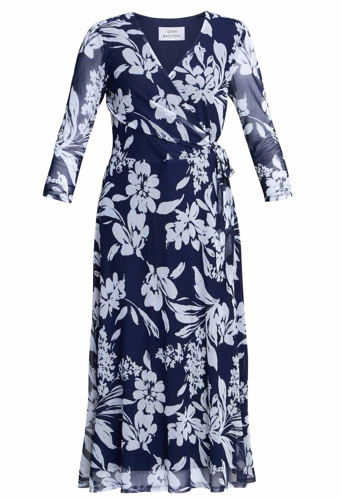Navy blue dress with white floral pattern on a white background
