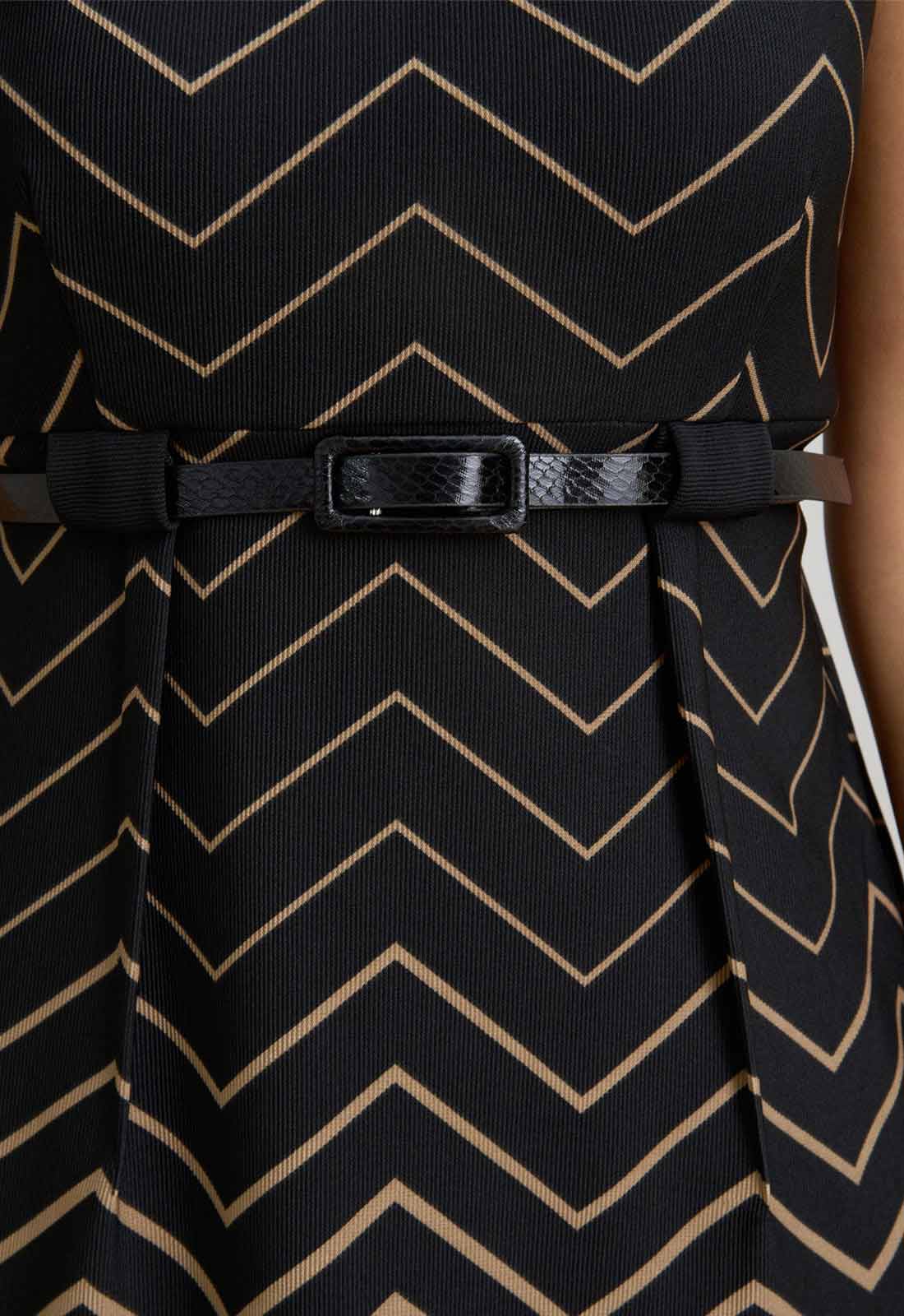 close up of the belt on this bronze patterned dress