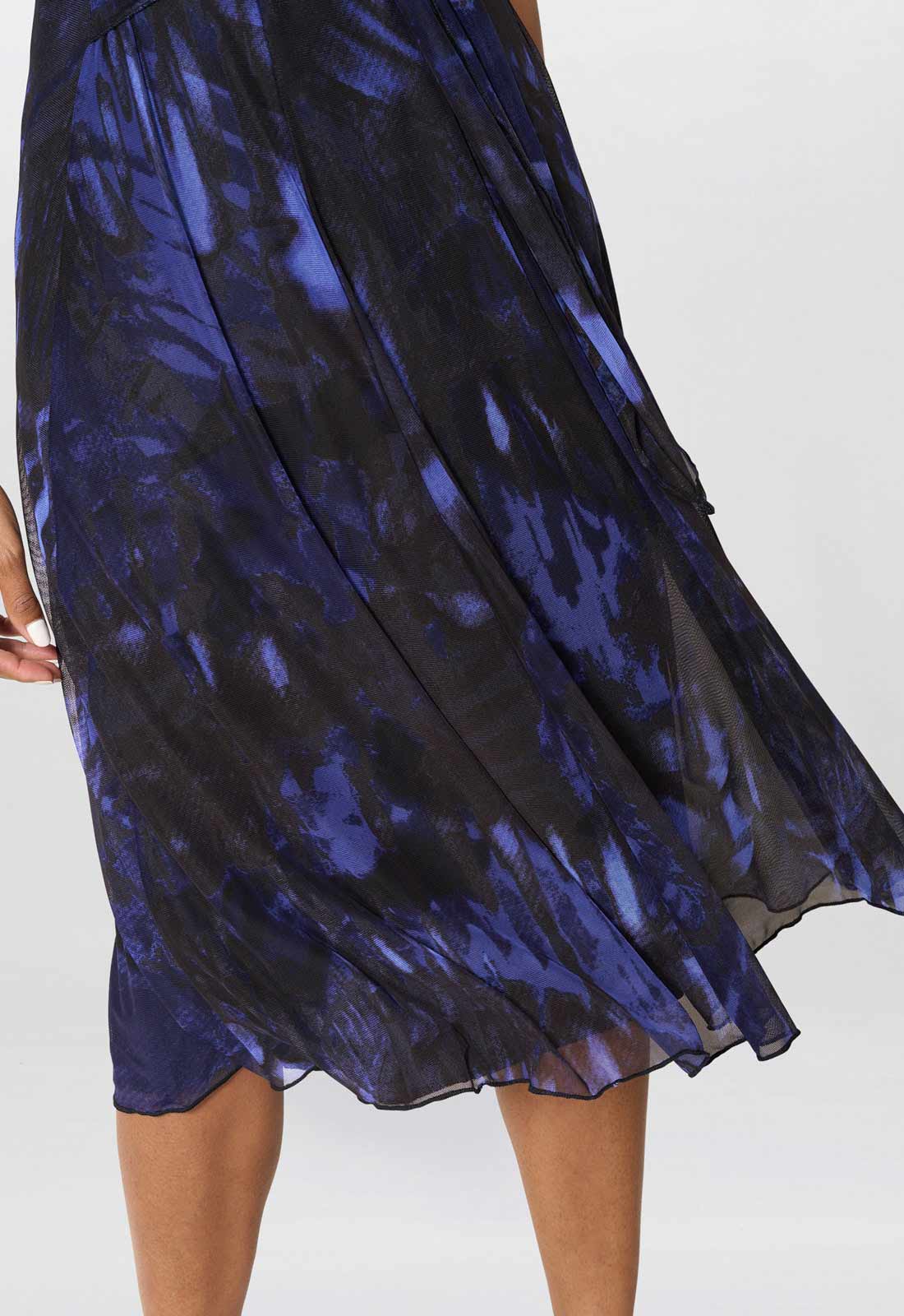 Blue and black patterned skirt on a white background