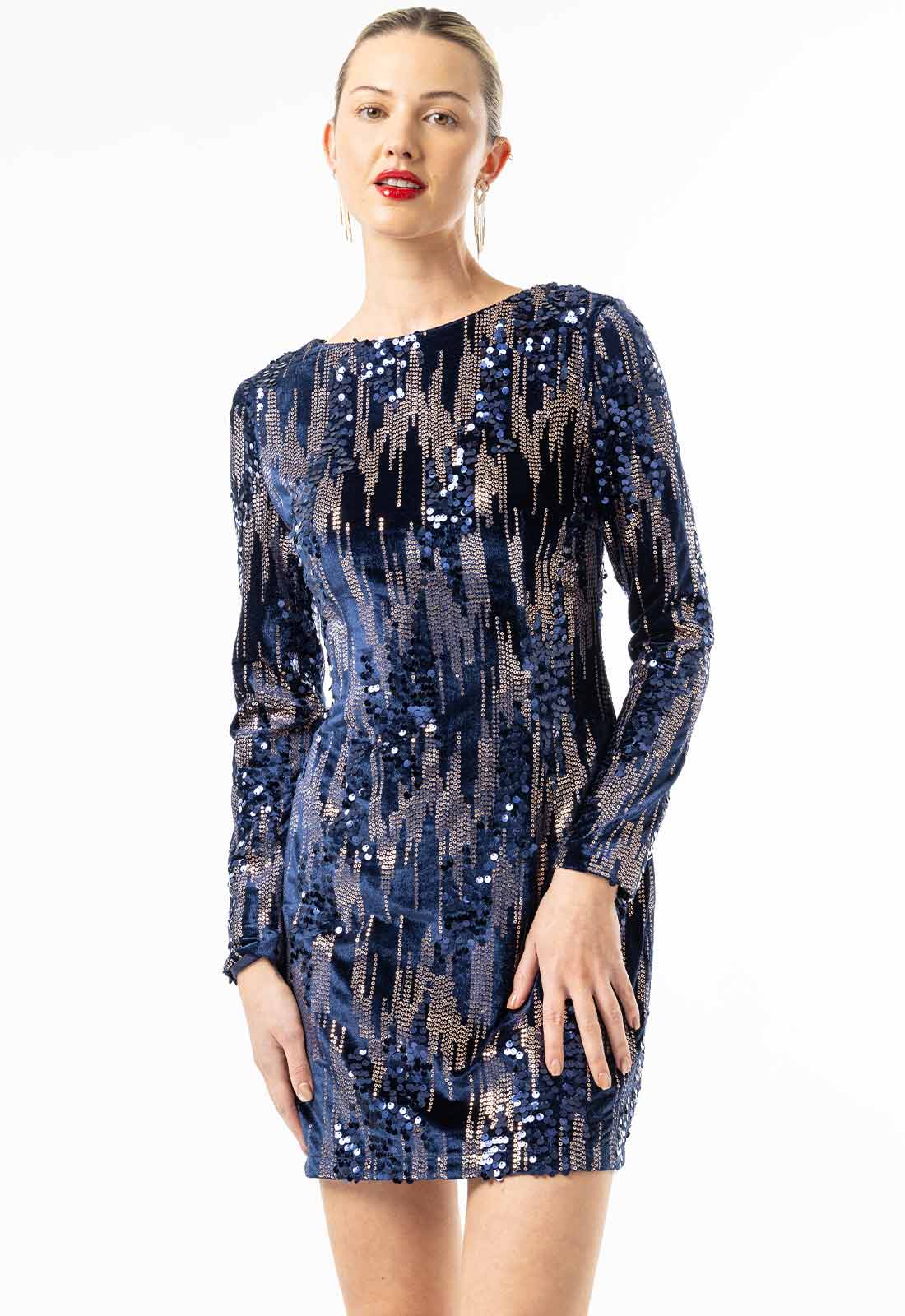 Woman wearing a blue sequin dress on a white background